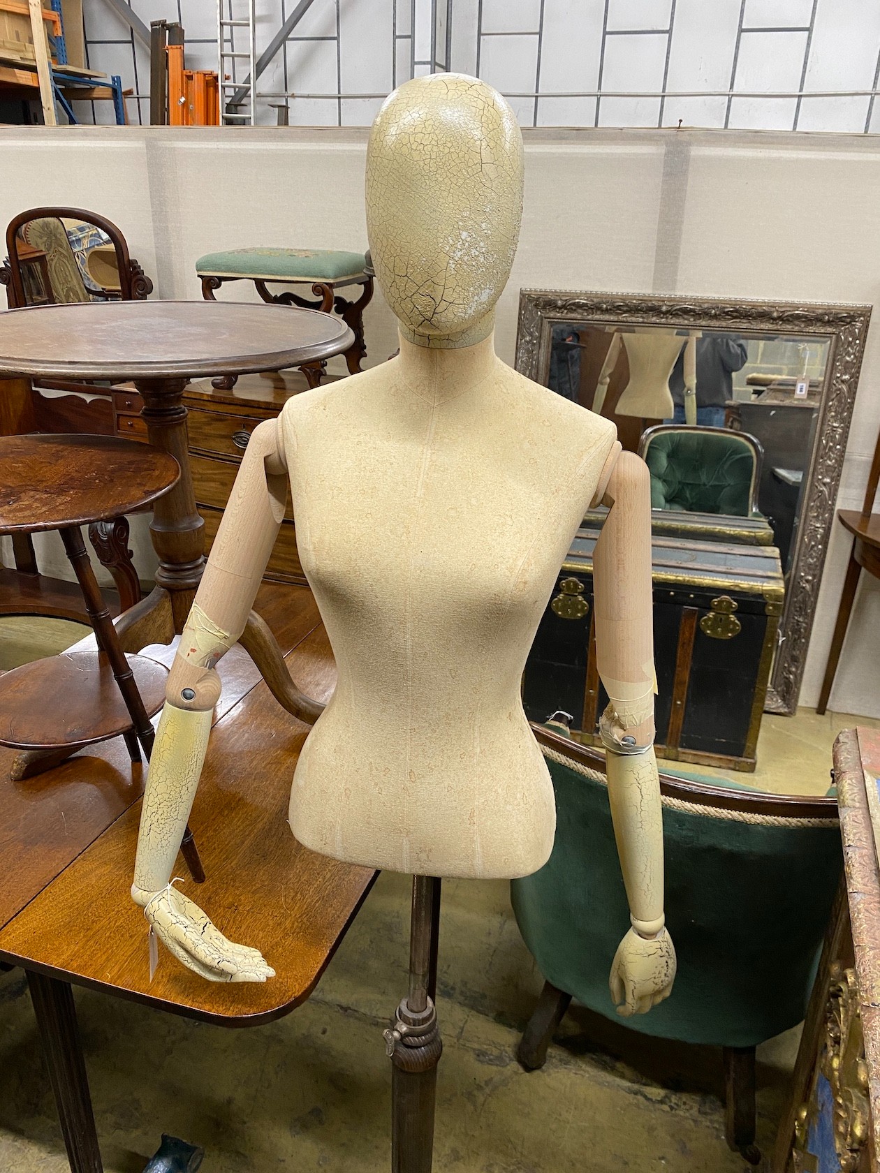 A Victorian style canvas beech and composition mannequin on telescopic stand